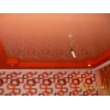Мини-фото: Глянцевый натяжной потолок оранжевый