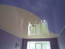 Фото: Натяжной потолок криволинейная спайка фиолетово-белый №2